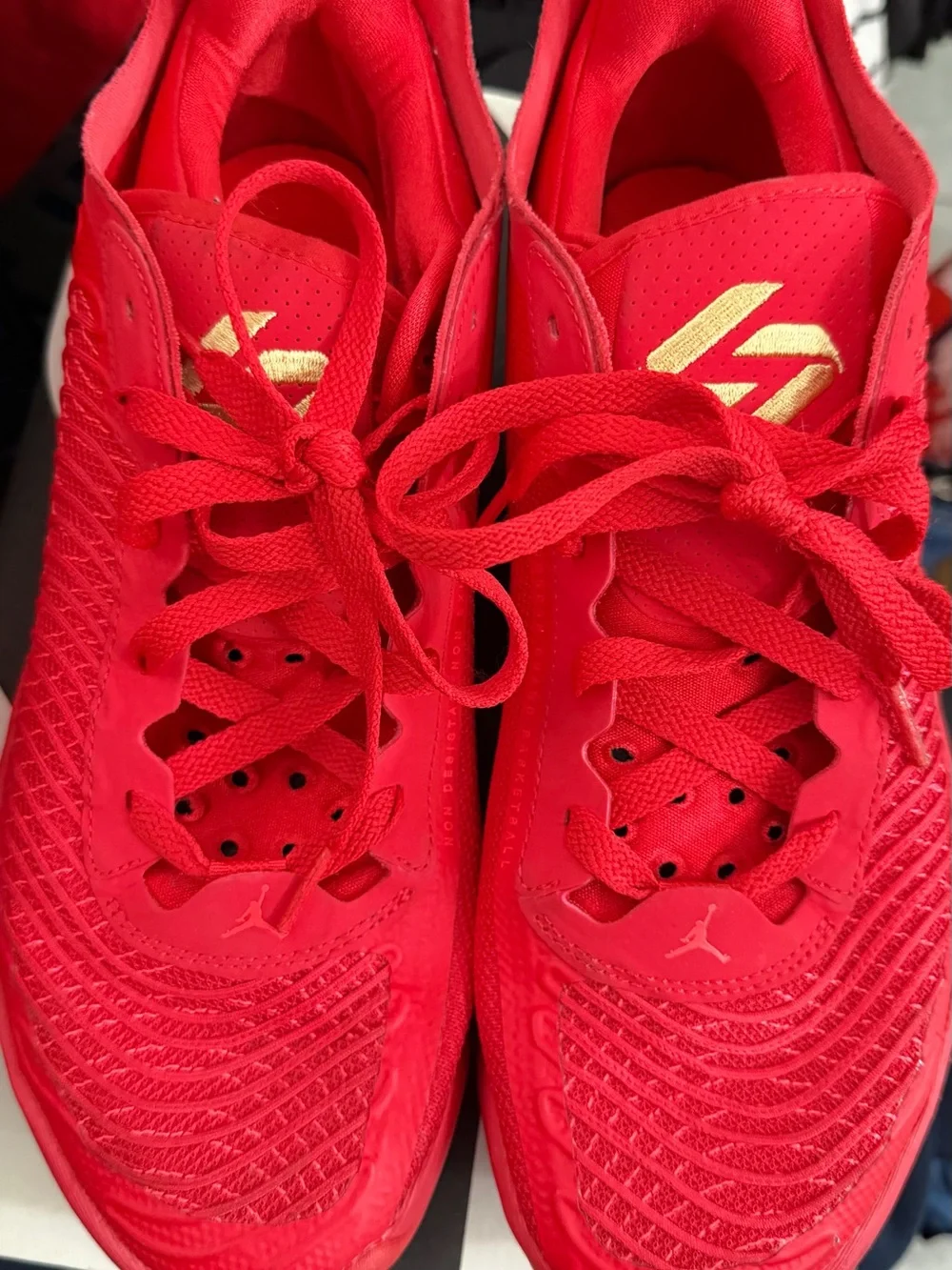 Jordan Men’s Red Athletic Shoes with Gold Logo Accents